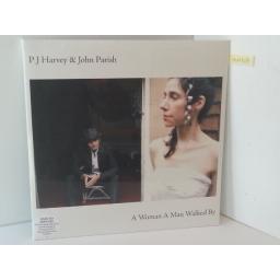 PJ HARVEY AND JOHN PARISH a woman a man walked by. Includes poster and 12" x 12" sleeve artwork. 1797426