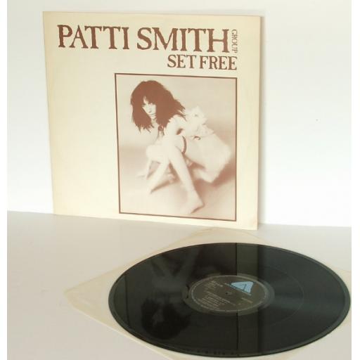 PATTI SMITH GROUP set free 12 inch singleTop copy. First UK pressing. 1978.