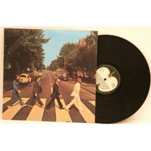 Rare miss-aligned Apple on rear sleeve and no "HER MAJESTY" credit. BEATLES, Abbey Road.