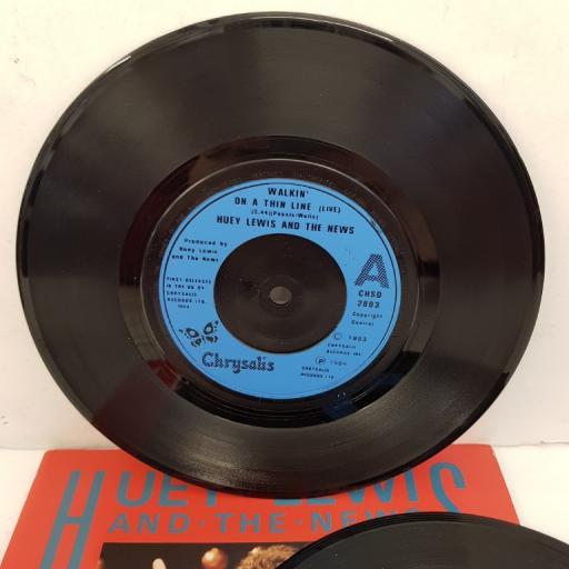 HUEY LEWIS AND THE NEWS - If This Is It, B: Change Of Heart, C: Walkin' On A Thin Line (Live), D: Working For A Living (Live). 2x7", CHSD 2803, blue label