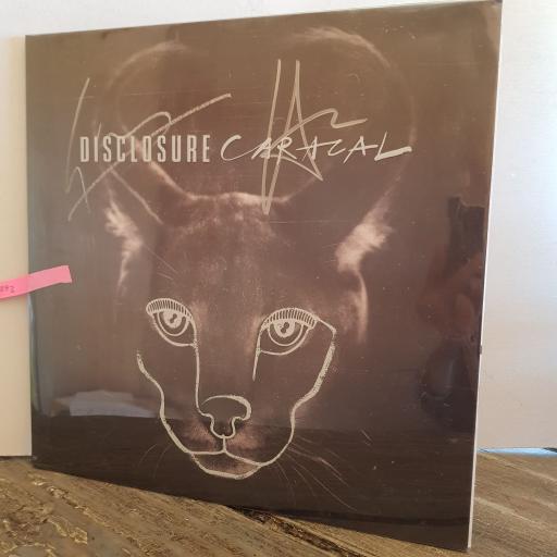 SIGNED COPY WITH PRINT. DISCLOSURE Caracal. 12" vinyl LP. PMR068