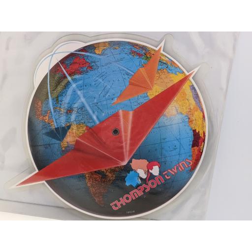 THOMPSON TWINS Passion planet 7" cut-out picture disc single. TWISD4