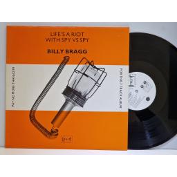 BILLY BRAGG Life's a riot with spy VS. spy 12" vinyl 45 RPM. UTIL1