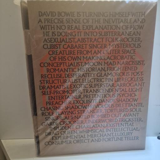 DAVID BOWIE DAVID BOWIE IS. PERSONAL PORTFOLIO. BLACK EDITION. 2016. SIGNED PHOTOGRAPH.