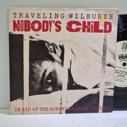 TRAVELLING WILBURYS Nobody’s child, Lumiere 7” single. W9773